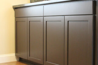 custom dark painted standalone kitchen cabinet