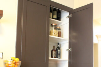 built-in custom dark wood pantry closet